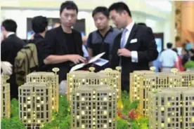 封杀零首付，严查“假按揭”图片