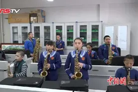 走进乌鲁木齐盲童萨克斯乐团 小乐手：萨克斯像月亮图片