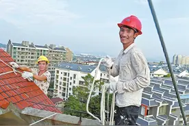 高空“蜘蛛人” 城市美容师图片