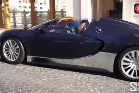 这台百公里油耗70升的布加迪油箱有多大？升起尾翼看看就知道了！