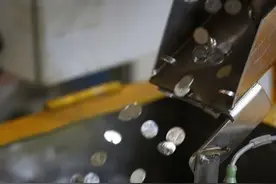 探访沈阳造币厂：员工见钱最多 出车间需安检识别金属制品图片