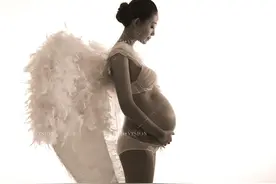 北京婚纱摄影工作室孕妇写真穿什么最时尚图片