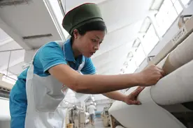 纺织女工刘沙：织布机上的奋斗故事图片