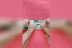 50和20的人民币折叠出520的爱心小衣服视频封面