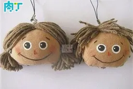 手工布艺娃娃diy 可爱的娃娃头挂件图片