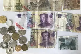 假残币五花八门 公交投币箱一年收万元假残币图片