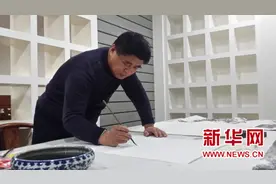 画家李龙潭猴年谈猴文化图片