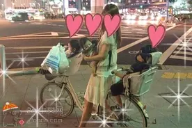 出人意料！日本年轻妈妈这样骑自行车图片