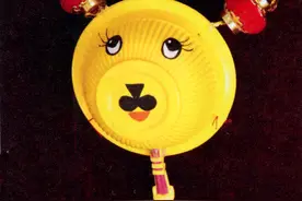 幼儿园玩偶制作：拨浪鼓小黄狗图片