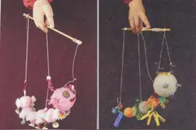 幼儿园提线木偶制作：大眼毛毛虫图片