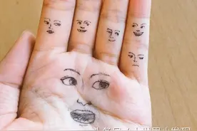 岛国一小哥在手上画满小脸，看能不能全被变脸软件识别,结果?图片