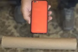 废旧卷纸筒加上两个杯子，放上手机变成声音扩大器图片