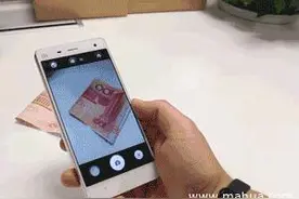 搞笑GIF:这样的手机请务必给我来一打图片