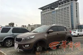 一夜之间 渭南一停车场内2车8个轮不翼而飞图片