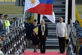 日本天皇夫妇访菲律宾 悼念二战亡魂成焦点图片