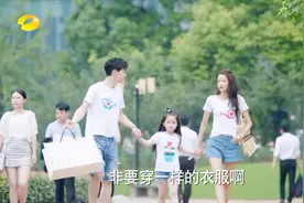 幸福的一家三口，爸爸帅气，妈妈漂亮，女儿甚是可爱