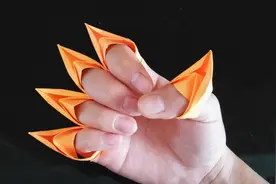 一分钟学会折纸金刚狼爪戒指，简单帅气又好玩，手工折纸大全视频封面
