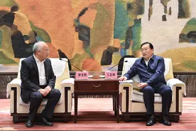 王忠林与中国铁投总经理谭光明座谈图片