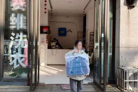 失而复得的西服：洗衣店“弄丢”只愿赔350元，她发帖曝光后店主又找到了图片