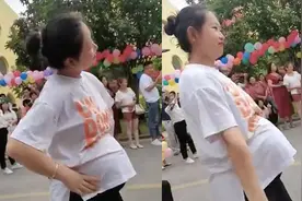 “最美孕妇幼师”挺大肚子教孩子跳舞 网友：最好的胎教图片