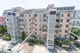 老旧小区加装电梯，上海出地方标准，充分考虑“适老化”并控制对周边影响图片