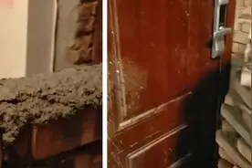 居民楼道里砌墙对抗邻居扩门，目击者：两家多次冲突视频封面