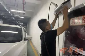 西安海璟印象城小区业主反映车库安装汽车充电桩存隐患 物业：正协调车主拆除图片