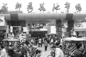 记得曾经的成都荷花池吗？我曾在那电瓶车乱穿的路上发生交通事故图片