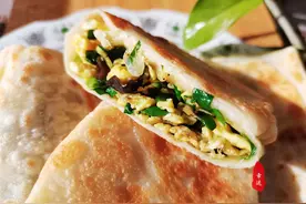 薄皮大馅的韭菜盒子，料足鲜香不油不腻，配上一碗稀粥更加完美图片