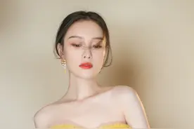 黄色裙装似“公主裙”，倪妮服装色彩鲜艳，带给人们童话般的想象图片