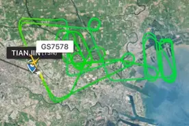 天津航空一客机起飞后在空中盘旋数十圈返航图片