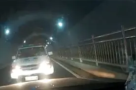 扣15分，罚款1200元！酒驾司机隧道出口见民警设卡，竟倒车800米