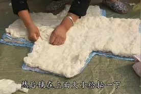 农村传统手艺制作棉衣，幼儿穿着舒服还暖和，会做的人不多了