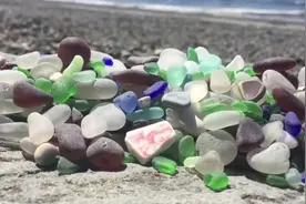 海边捡到一堆的漂亮石头，有人说这是羊脂玉，很值钱的，真的吗？视频封面