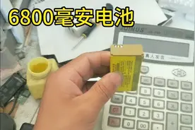 用旧手手机电池改装一个计算器外置电池，充一次电能用一两年吗？