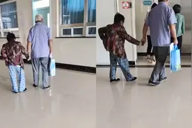 爷爷紧紧牵住奶奶的手在医院就医 网友：这才是真正的老来有伴！视频封面