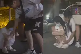 女生闹脾气蹲路边不走，男生上前拉几次都没用，下招女友瞬间消气