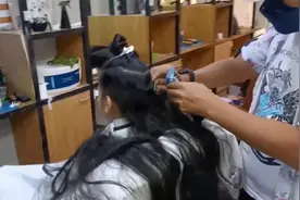 妹子挺臭美的，把长发剪成男生发型后，让人分不出男女