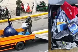 上海某银行惊现可疑箱包 警方辟谣后网友发现箱内藏着"励志鸡汤"