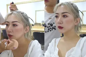 化妆师给女演员画唇妆，颜色均匀，唇形勾勒清晰，实在是太好看了