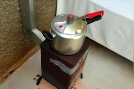 看牛人如何利用废弃的奶粉罐自制锯末炉子，取暖做饭好实用