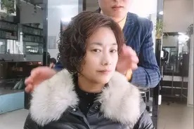 烫了两个月不到的头发，直接给她剪短了，剪完气场都变了