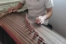 探讨古筝名曲《渔舟唱晚》一浆接着一浆划的音乐表达