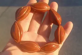 把玩十多年的橄榄核手串，包浆已变红慢慢玉化了视频封面