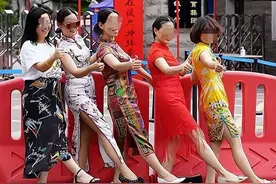 高考警钟：穿旗袍紫内裤的家长行为引热议，别再作妖了！图片