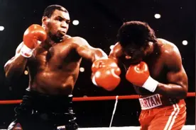 1988年，拳王泰森花1万美元贿赂饲养员，想和银背大猩猩一决高下图片