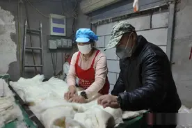 翻新棉被+定做羽绒服 这样御寒更“划算”！图片