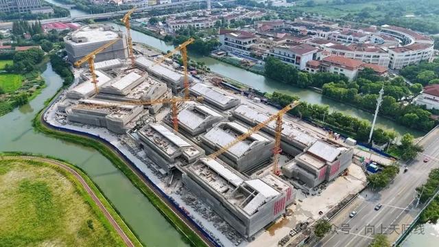 亚洲最大奥特莱斯 商业街全面结构封顶！