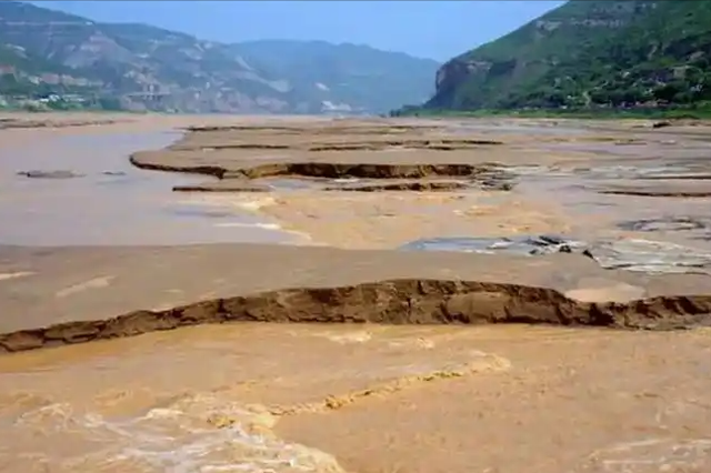 黄河下游拉直入黄海，铲平800里悬河泥沙，这个工程可行吗？