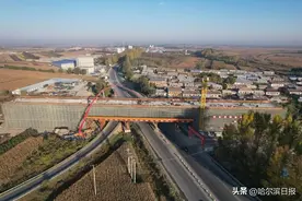 喜讯！哈伊高铁永兴呼兰河特大桥跨国道G202黑大公路（48+80+48）米连续梁顺利合龙图片